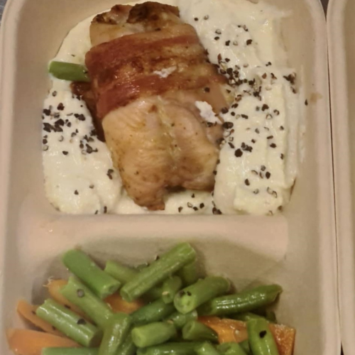 Chicken wrapped in bacon, with veges
